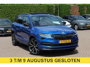 Skoda Karoq - 2.0 TSI 4x4 Sportline Business / NL Auto! / Trekhaak / Panor