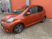 Toyota Aygo - 1.0 VVT-i Dynamic Orange 5 DEURS APK -AIRCO