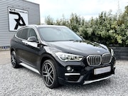 BMW X1 - sDrive18i Aut Leer|Camera|Memory|Navi|Trekhaak Zwart