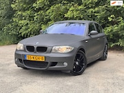 BMW 1-serie - 116i | Cruise control + Navi + Leder Nu € 3.475,