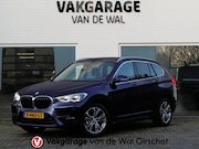 BMW X1 - sDrive18i High Executive | Orange edition | Trekhaak | Achte