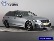 BMW 3-serie - Touring 318i M Sport (NL-Auto / Pano / Elek. trekhaak / Spor
