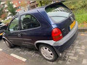 Opel Corsa - 1.2i-16V Strada Cool