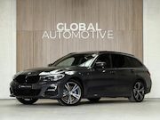 BMW 3-serie - Touring 330e xDrive High Executive M Sport - Dravit Grau - L