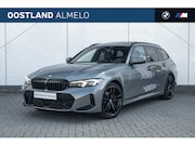 BMW 3-serie - 320e M Sport Automaat / Trekhaak / Panoramadak / Sportstoele