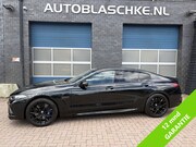 BMW 8-serie Gran Coupé - M8 Competition, all black.