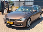 BMW 3-serie - 320i High Executive Automaat Pano Navi Leer Clima