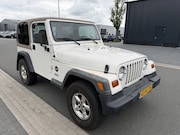 Jeep Wrangler - 2.5i Softtop Sahara Cabrio 1999 Benzine 4X4