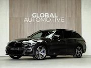 BMW 3-serie - Touring 330e xDrive High Executive M Sport - Dravit Grau - L
