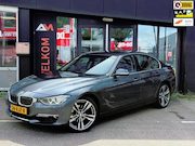 BMW 3-serie - 320i High Executive | Airco | Cruise | Navi | Leer