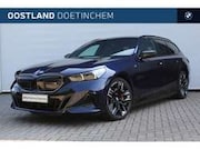 BMW i5 - Touring M60 xDrive / Trekhaak / Panoramadak / Bowe