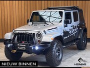 Jeep Wrangler - Unlimited | Cabriolet | Trekhaak | Camera | Airco | 17 inch 
