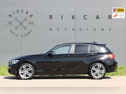 BMW 1-serie - 116i Centennial High Executive AllSeason Dakspoiler NIEUWBIN