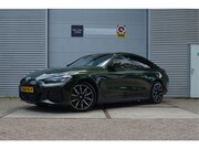 BMW i4 - eDrive40 High Executive 84 kWh Trekhaak, Pano, M-Sport Stoel