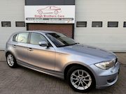 BMW 1-serie - 116i AUTOMAAT LEER NAVI NAP PDC INRUIL MOG