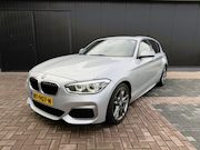 BMW 1-serie - M135i xDrive | Panoramadak | Leder | harman/kardon | Stuur/s