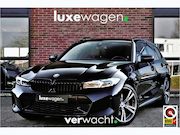 BMW 3-serie - Touring 330e M-Sport Pano DA-Prof E-zetels HUD 19inch