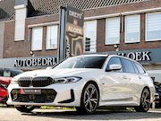 BMW 3-serie - Touring 330e M-Sport PANO CAMERA HUD HIFI ELEK TREKHAAK ADAP