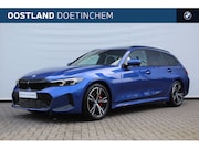 BMW 3-serie - 320i High Executive M Sport Automaat / Panoramadak / Trekhaa
