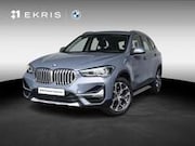 BMW X1 - sDrive20i | High Executive | Orange Edition | Acht