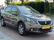 Peugeot 2008 - 1.2 P-Tech Blue *AUTOMAAT|PANO|NAVI I lichte schad