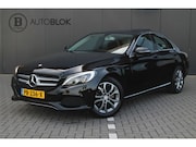 Mercedes-Benz C-klasse - 180 | AMG | Panoramadak | Camera | Origineel NL | Dealer ond