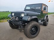 Jeep Wrangler - 4.0i Softtop 4x4 cabrio