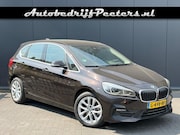 BMW 2-serie Active Tourer - 218i Aut. 1e eigenaar HUD Navi+ Camera LED Cruise NL-auto