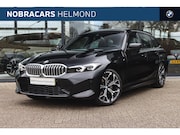BMW 3-serie - 320i M Sport Automaat / Panoramadak / Trekhaak / Sportstoele