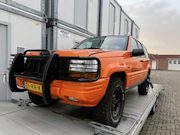 Jeep Grand Cherokee - 5.2i V8 Limited Lees advertentie