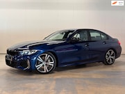 BMW 3-serie - 330e High Executive | M-SPORT | ACC | LEDER | ZWART HEMEL