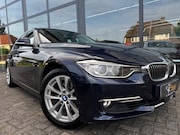 BMW 3-serie - 320i High Executive | Leer | Open dak