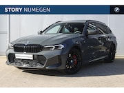 BMW 3-serie - 320e High Executive M Sport Automaat / panoramadak / Trekhaa