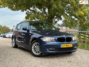 BMW 1-serie - 118i Business Line | Navi + Cruise + Clima Nu € 3.975,