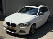 BMW 1-serie - M135i xDrive High Executive l Schuifdak l Volleder l Groot N