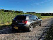 BMW 1-serie - M135i xDrive High Executive I Panoramadak I Harmon Kardon I