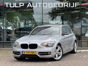 BMW 1-serie - 118i Sport Line Airco Cruise Navi Open dak PDC