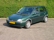 Opel Corsa - 1.4i CDX nieuwe distributieriem en gereviseerde cil.kop NL a