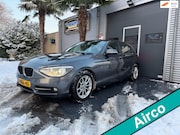 BMW 1-serie - 116d EDE Corporate Lease Executive AIRCO Super Auto