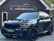 BMW X5 - XDrive45e High Executive Panoramadak HUD M Kuipstoelen LASER