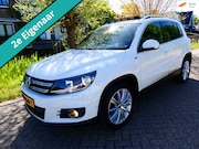 Volkswagen Tiguan - 1.4 TSI R-Line 122pk 2e eig. Clima Navi PDC Pano Xenon