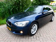 BMW 1-serie - 116i 3-deurs 136pk 4-Cil. Airco Cruise Leder Navi Historie G