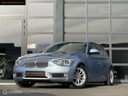 BMW 1-serie - 114i Urban Line BI XENON / NAVI / CRUISE
