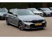 BMW 3-serie - Touring 330e / SoH 88,5% / Trekhaak / Panoramadak / Camera /