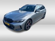 BMW 3-serie - Touring 330e / SoH 88,5% / Trekhaak / Panoramadak / Camera /