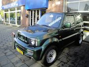 Suzuki Jimny - TOP 1.3 JLX (1e Eig./2011/86.600KM) met All-Weather banden