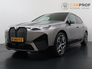 BMW iX - xDrive40 High Executive 77 kWh Trekhaak | SOH 97% | Pano | H