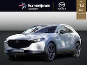 Mazda CX-30 - 2.5 e-SkyActiv-G M Hybrid Makoto | Logo's Black Chrome | Nie