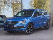 Skoda Karoq - 1.5 TSI ACT Sportline 150PK DSG Adapt. Cruise Race Blue 22.0