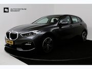 BMW 1-serie - 118i High Executive (STOELVERWARMING, SFEERVERLICHTING, NAVI